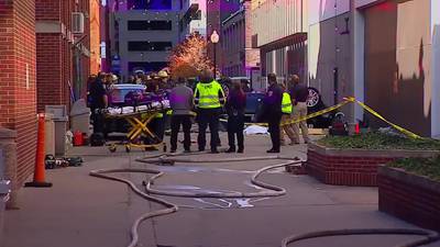 2 dead when vehicle plunges 4 stories from Indianapolis parking garage