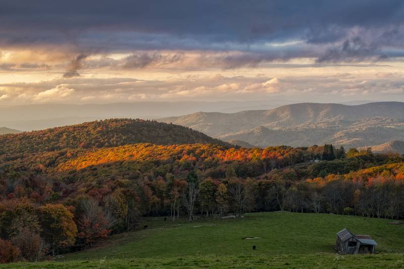 Meanwhile, sunset brings a patch of fall color to brilliant light, pictured Sunday near the Avery-Watauga county line, as fall color blankets the landscape looking from Banner Elk toward Boone.