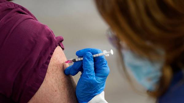COVID-19 herd immunity unlikely in 2021 despite vaccines, WHO says