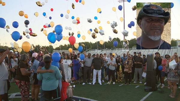 Vigil held at high school for coach slain in northeast Charlotte shooting