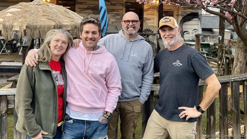 From left: Heather Brinsfield, Joey Hewell, Scott Lindsley and John Brinsfield. The Brinsfields, who are behind BrickTree Brewing Co. in Lincolnton, are taking over NoDa Company Store from its founders.