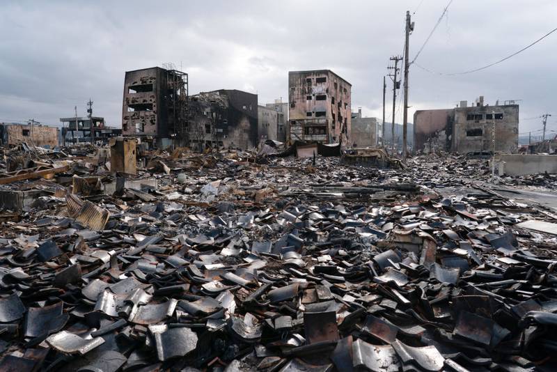 WAJIMA, JAPAN - JANUARY 05: The Asaichi Yokocho, or Wajima Morning Market, area, is seen after a fire incident following an earthquake on January 05, 2024 in Wajima, Japan. On New Year's Day, a series of major earthquakes reportedly killed at least 92 people, injured dozens more and destroyed a large amount of homes. The earthquakes, the biggest measuring 7.1 magnitude, hit the areas around Ishikawa, Toyama and Niigata in central Japan. (Photo by Tomohiro Ohsumi/Getty Images)