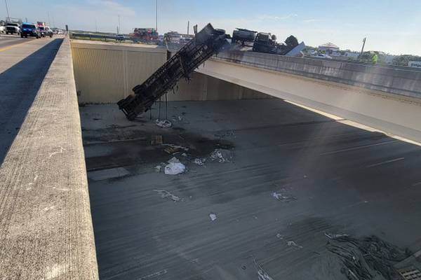 Watch: Tractor-trailer falls off overpass in Florida after fiery crash