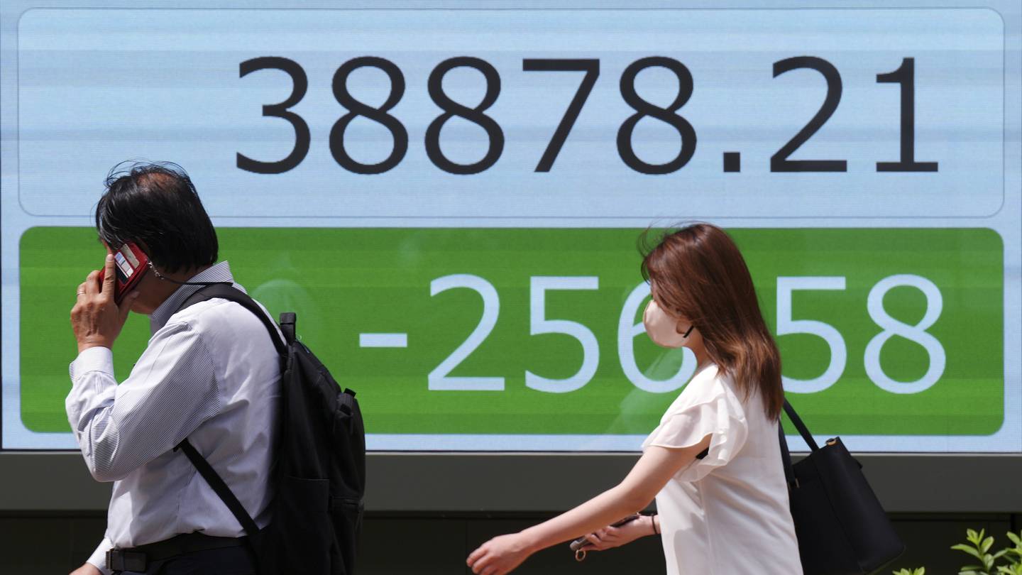 Stock market today: Asian shares are mixed ahead of a Fed decision on interest rates