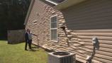 ‘It’s awful looking’: Homeowner says neighbor’s windows warped her siding