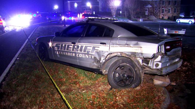 Dozens of police officers and deputies responded after a deputy was hit and injured by a stolen patrol car in Alexander County on Friday, Dec. 17, 2021.