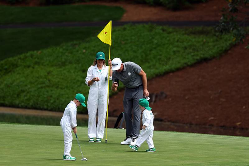 People golfing at Augusta National