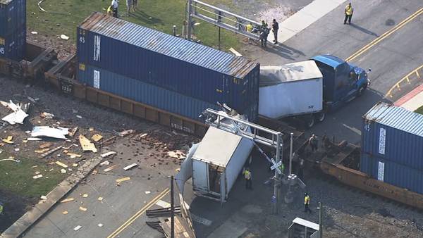 Train plows into semi-trailer stuck on tracks in Wingate; truck driver arrested