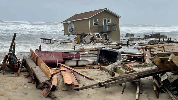 Park service warns of debris along Outer Banks after houses collapse into surf