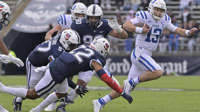 PHOTOS: Defense leads No. 18 Duke over UConn 41-7 in first road test of season