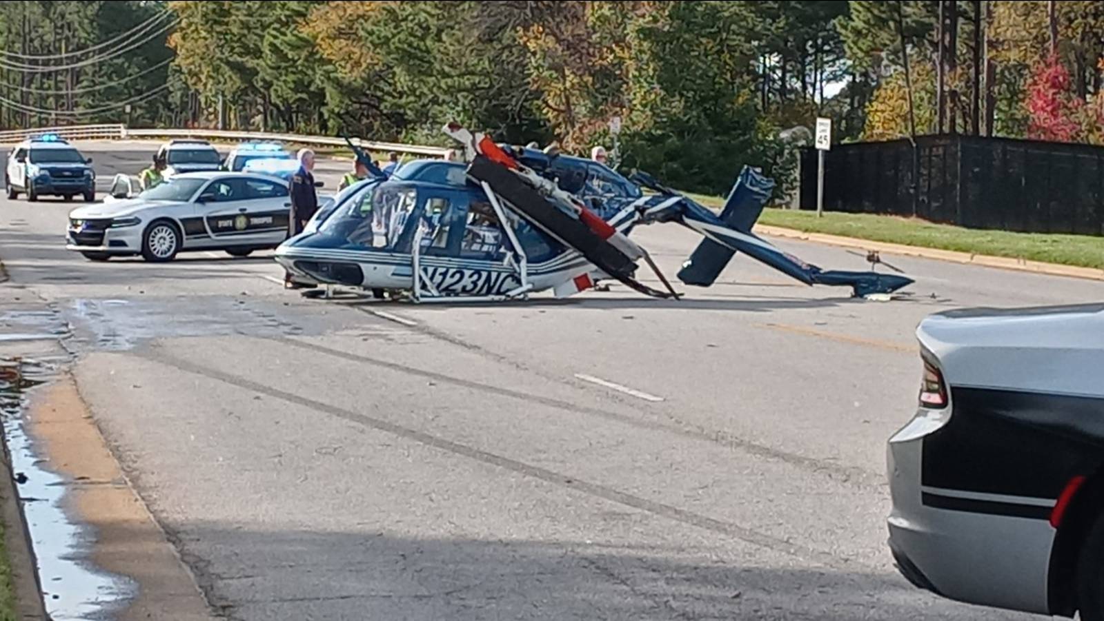 NC Highway Patrolowned helicopter crashes onto Raleigh street; pilot