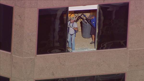 No one hurt when skyscraper window shot out in Uptown, police say