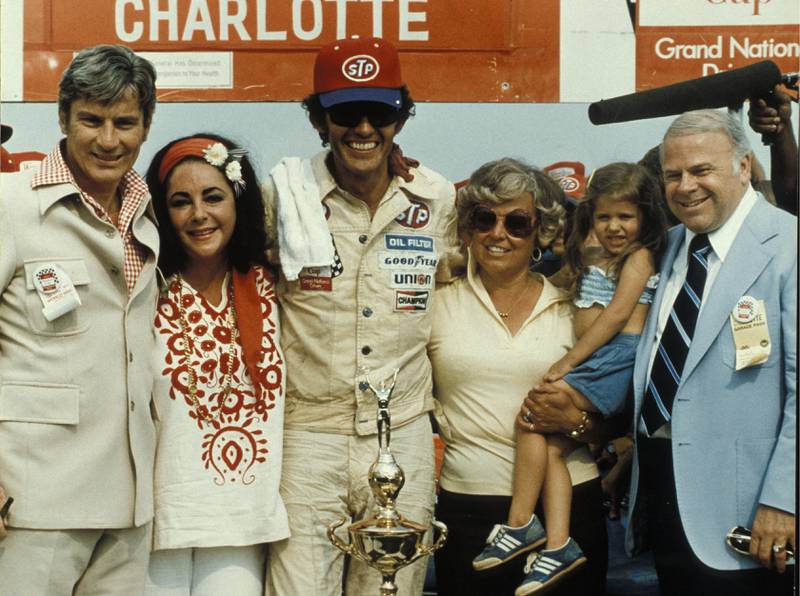 Bruton Smith in Victory Lane with Richard Petty and Liz Taylor.