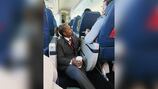 Photo goes viral after Delta Air Lines attendant comforts woman on Charlotte flight 