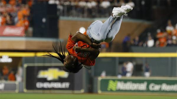 WATCH: Simone Biles flips, throws first pitch at World Series Game 2