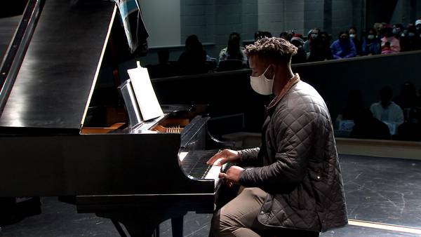 CMS students gifted piano from Panthers’ all-time leading rusher