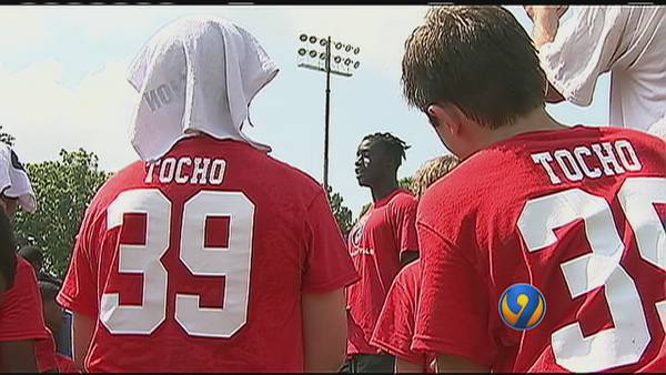 NFL player from Charlotte sets example on, off football field at inaugural youth camp