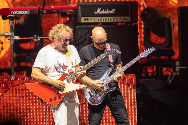 Sammy Hagar and Joe Satriani perform during the Best of All Worlds Tour at PNC Music Pavilion on July 19, 2024.