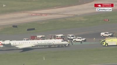 Photos: Passengers evacuated after American Airlines flight makes emergency landing