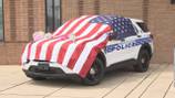 Fallen CMPD officer honored; cruiser draped with U.S. flag 