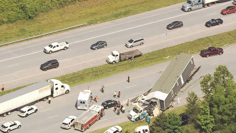 A tractor-trailer carrying a mobile home crashed, closing the inner loop of I-485.