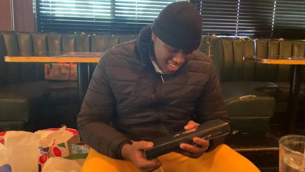West Charlotte HS football player gets special surprise before Christmas