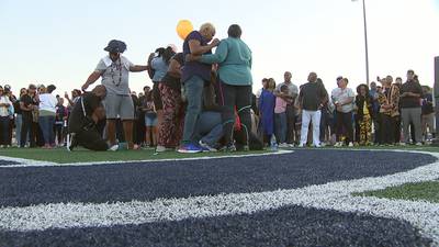 PHOTOS: Vigil held at high school for coach Ralph Hammond, who was killed in northeast Charlotte shooting