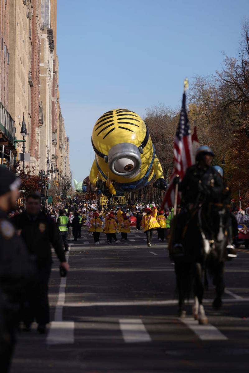 NEW YORK, NEW YORK - NOVEMBER 23: The Minion Stuart balloon heads down the parade route during the Macy's Thanksgiving Day Parade on November 23, 2023 in New York City. (Photo by Michael Loccisano/Getty Images)