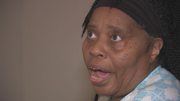 Charlotte woman lucky to be alive after she says celebratory gunfire struck her home