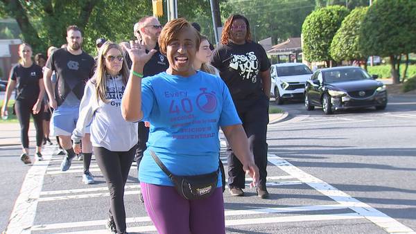 ‘Get involved, educated’: Several gather for annual suicide prevention walk in University City 