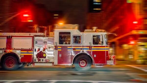 Man charged with setting New York spa on fire with victim trapped inside