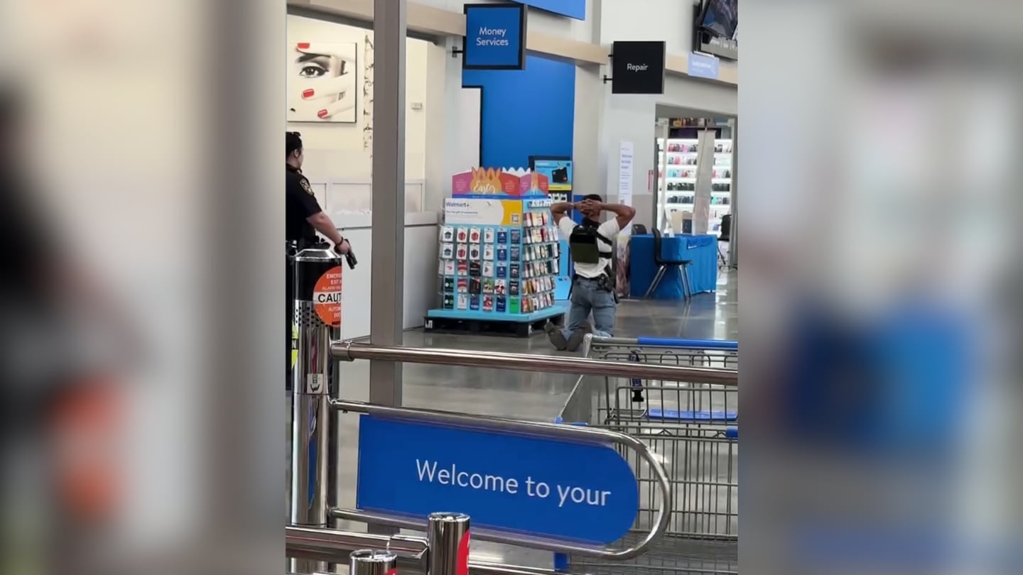 Monroe police confront armed man in Walmart; Photo: Shirley Taylor