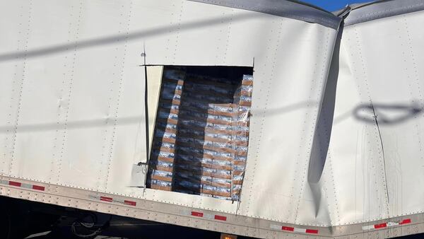 PHOTOS: Tractor-trailer buckles under weight of beer cases in Gaston Co.