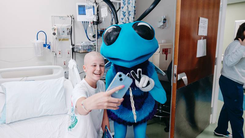 Charlotte Hornets players LaMelo Ball and Vasilije Micic along with Hugo the Hornet visited Novant Health Hemby Children’s Hospital on April 8, 2024. The group went room-to-room delivering and autographing Hugo children’s books and visiting with patients and their families.