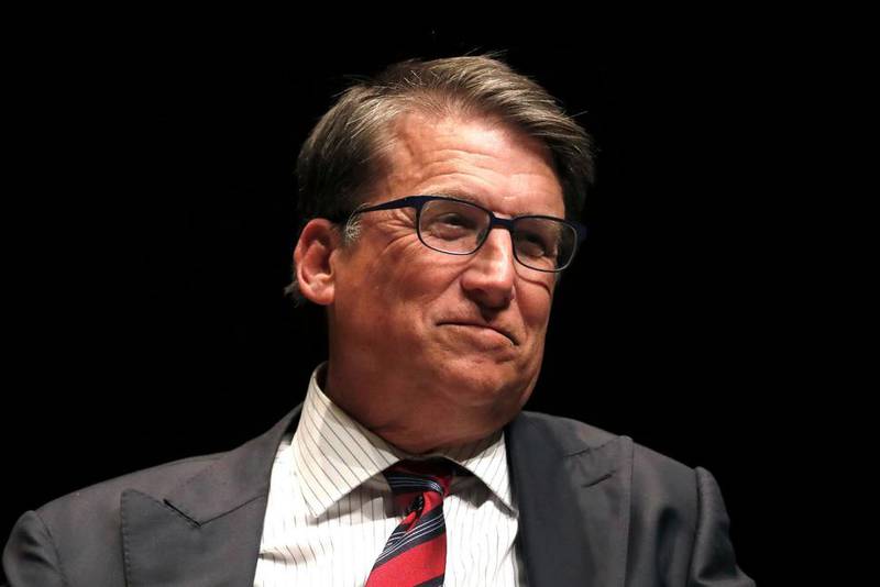 FILE - In this Thursday, Jan. 16, 2020, file photo, former North Carolina Gov. Pat McCrory participates in a University of North Carolina Institute of Politics forum in Chapel Hill, N.C.