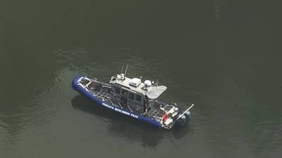 PHOTOS: Police search water after chase ends at Mountain Island Lake