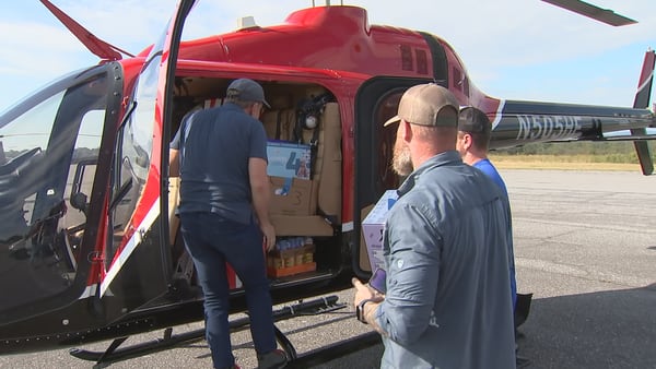 Volunteers in Hickory use their helicopters to fly supplies to Helene victims