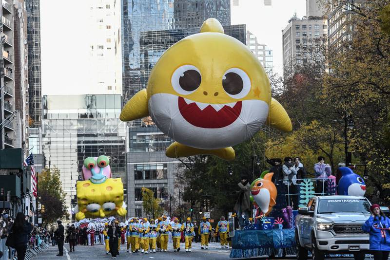 NEW YORK, NEW YORK - NOVEMBER 23: Balloons float in Macy's annual Thanksgiving Day Parade on November 23, 2023 in New York City. Thousands of people lined the streets to watch the 25 balloons and hundreds of performers march in this parade happening since 1924. (Photo by Stephanie Keith/Getty Images)