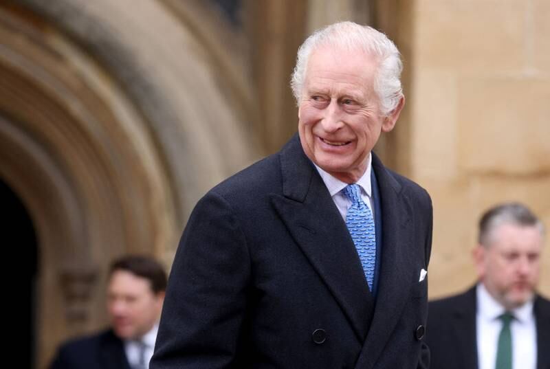 WINDSOR, ENGLAND - MARCH 31: King Charles III smiles as he leaves after attending the Easter Mattins Service at at St. George's Chapel, Windsor Castle on March 31, 2024 in Windsor, England. (Photo by Hollie Adams - WPA Pool/Getty Images)