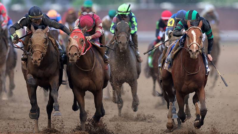 Horses running at the Kentucky Derby