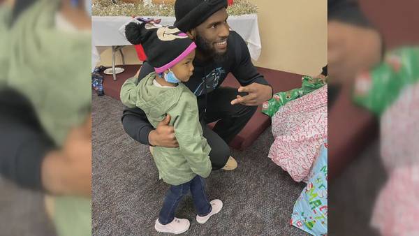 Panthers player Brian Burns brings the holidays to family center in west Charlotte