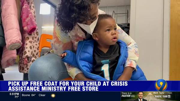 Mom, son shop for new winter Steve's Coat at Crisis Assistance Ministry