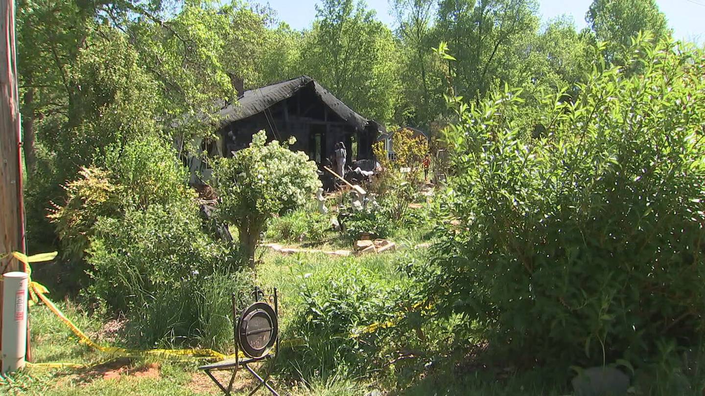 The charred remains of a home after a deadly fire in Lincolnton