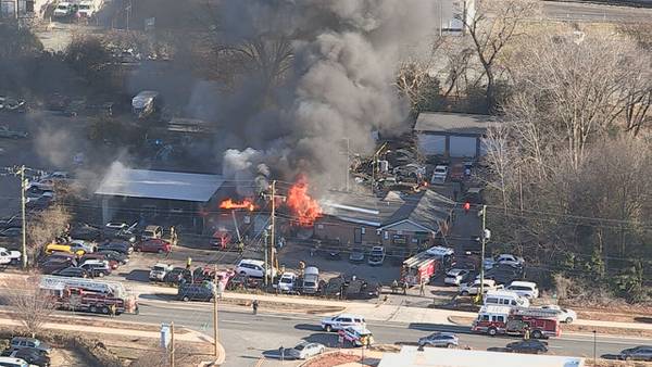 Worker injured after flames, smoke engulf north Charlotte auto glass shop