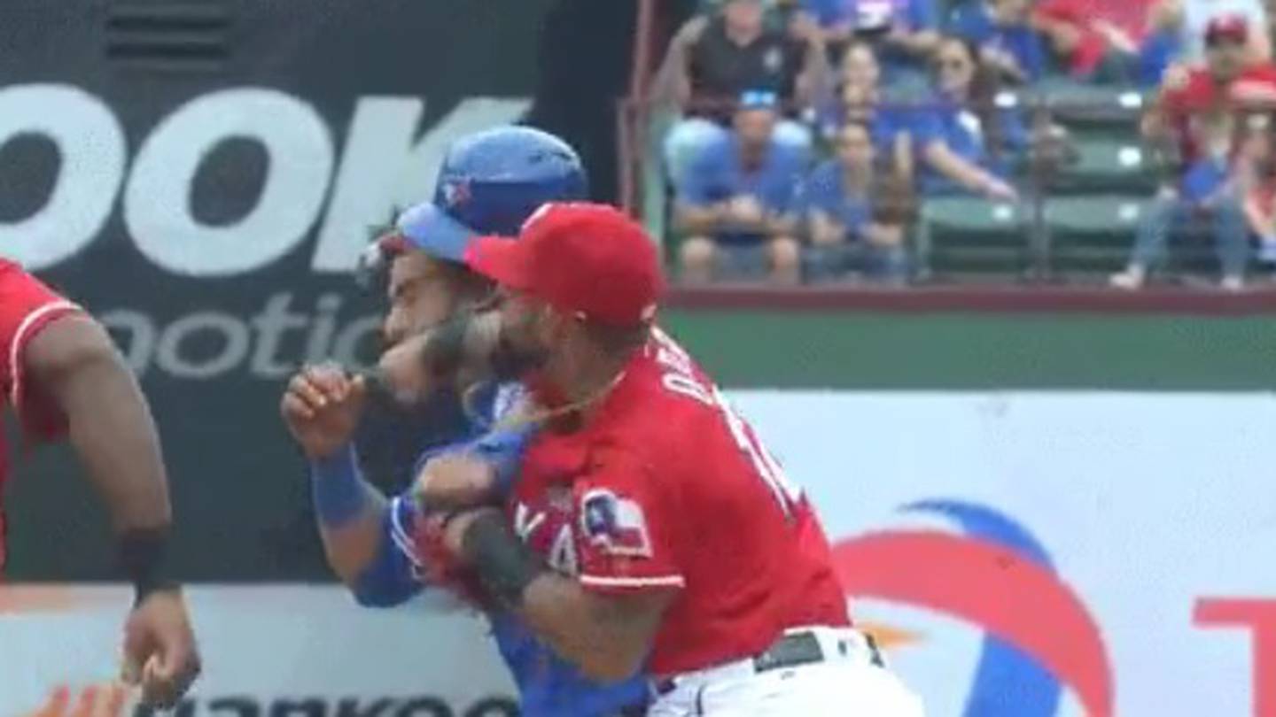 Rangers player punches Jose Bautista in the face during huge bench