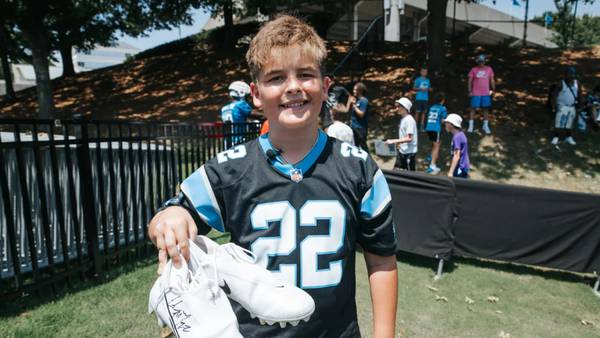 Panthers running back Christian McCaffrey makes a trade with lifelong fan