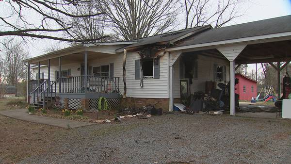 Father, home on day off, gets family out of burning house