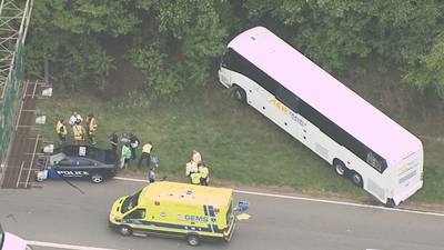 Photos: Bus with children on board crashes on I-85 in Gaston County