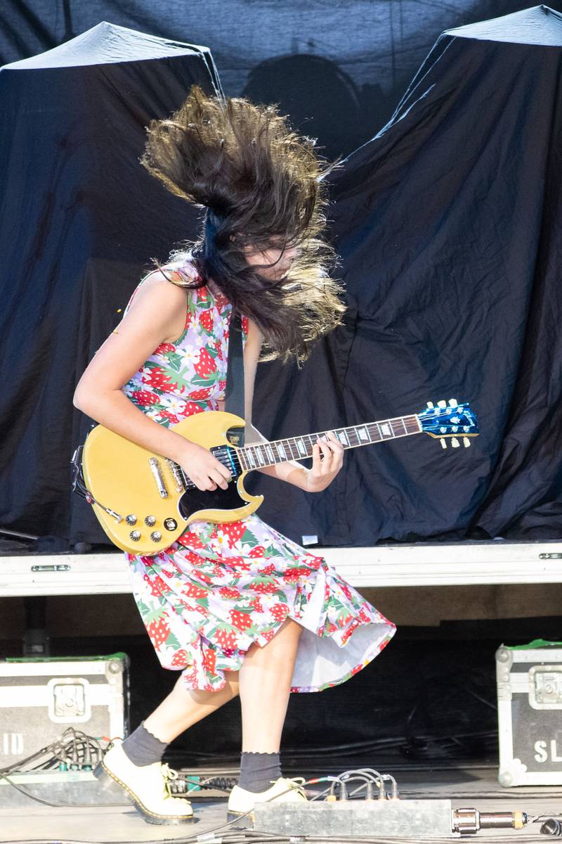 The Linda Lindas performs during the Savior Tour at PNC Music Pavilion on Aug. 26, 2024.