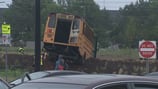 School bus hit by driver who ran red light in University City, CMS says